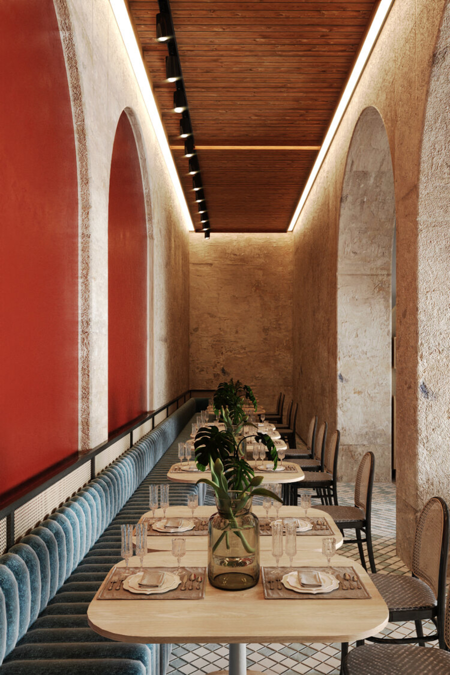 A restaurant furnished with custom dining tables and bespoke upholstery. 